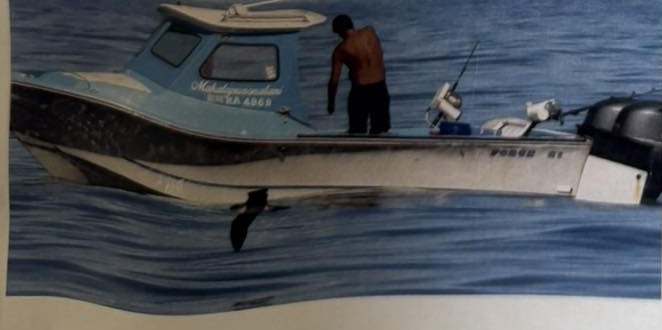 The vessel Makalapuaonalani at sea, white hull with light blue cabin